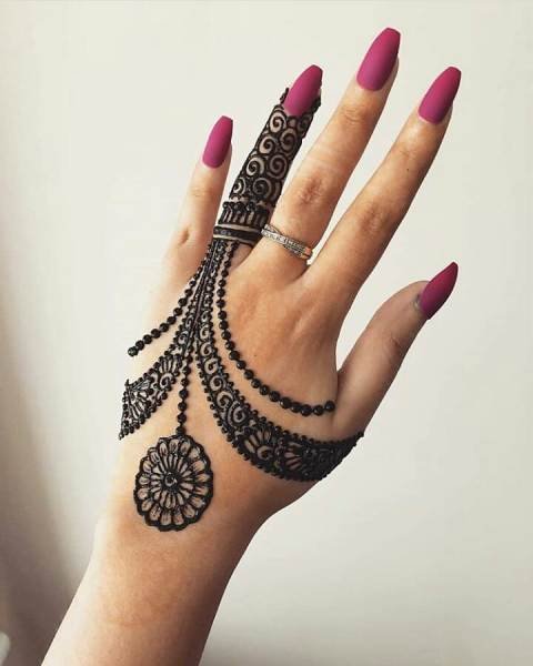 Back-Hand-Mehndi-Design-with-Jewelry