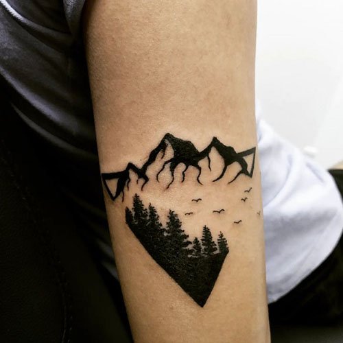 Tree-mountain-and-birds-tattoo